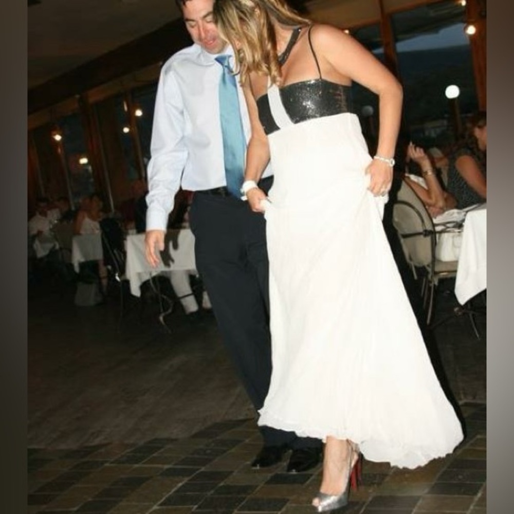 Custom made white dress with sequin detail.